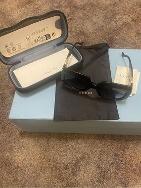 Gucci Black Rectangular Sunglasses with Gold GG Accents